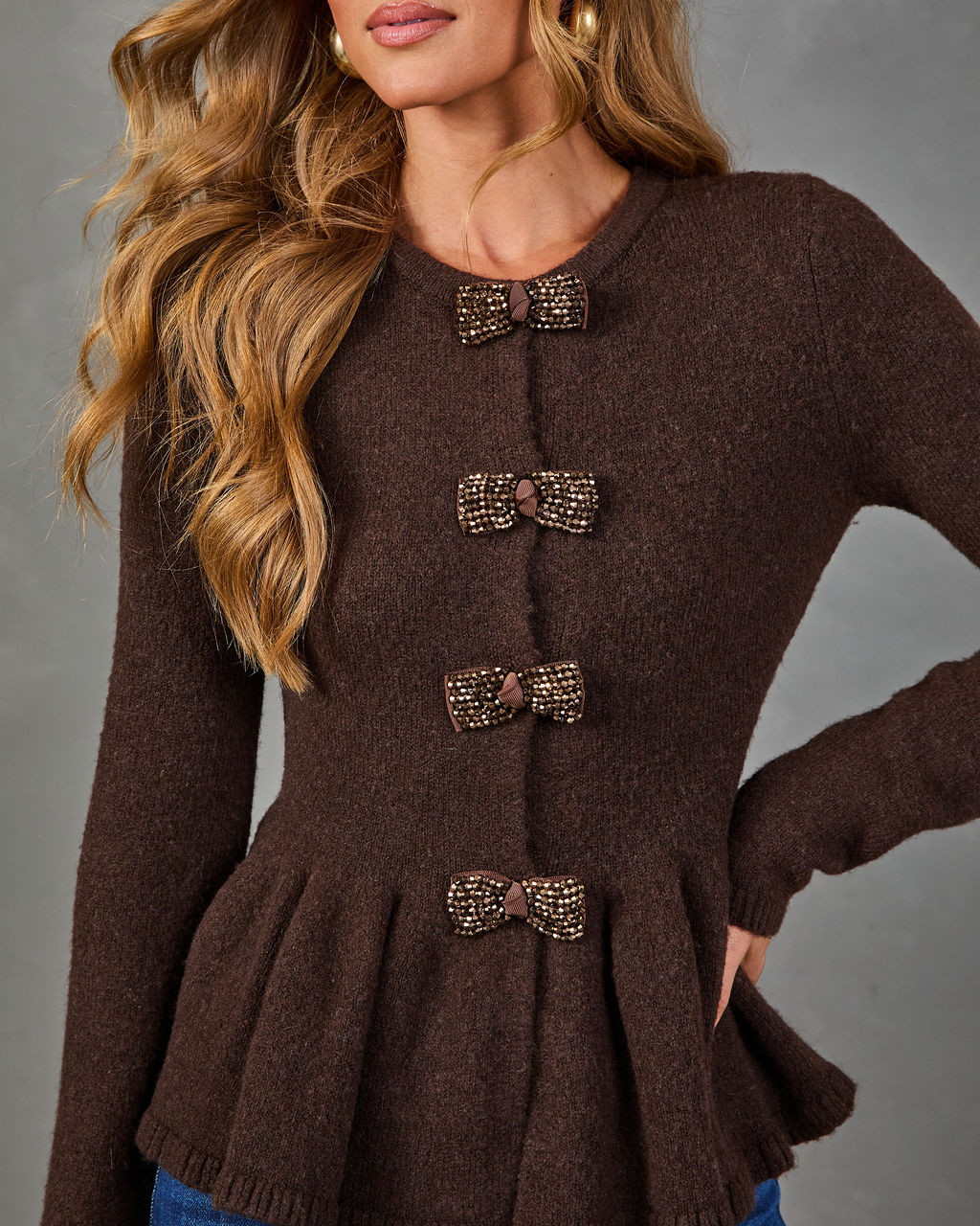 Dani Knit Bow Accent Peplum Sweater